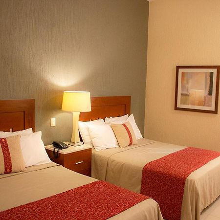 Hotel Fenix ลอสโมชิส ภายนอก รูปภาพ